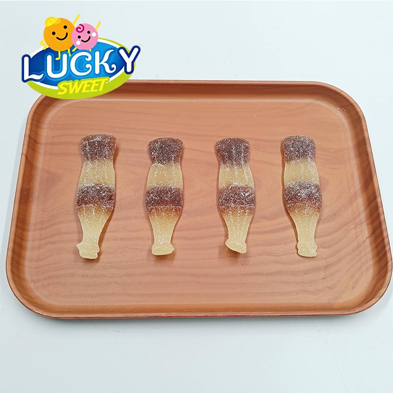 Cola-shaped sugar-dusted gummies