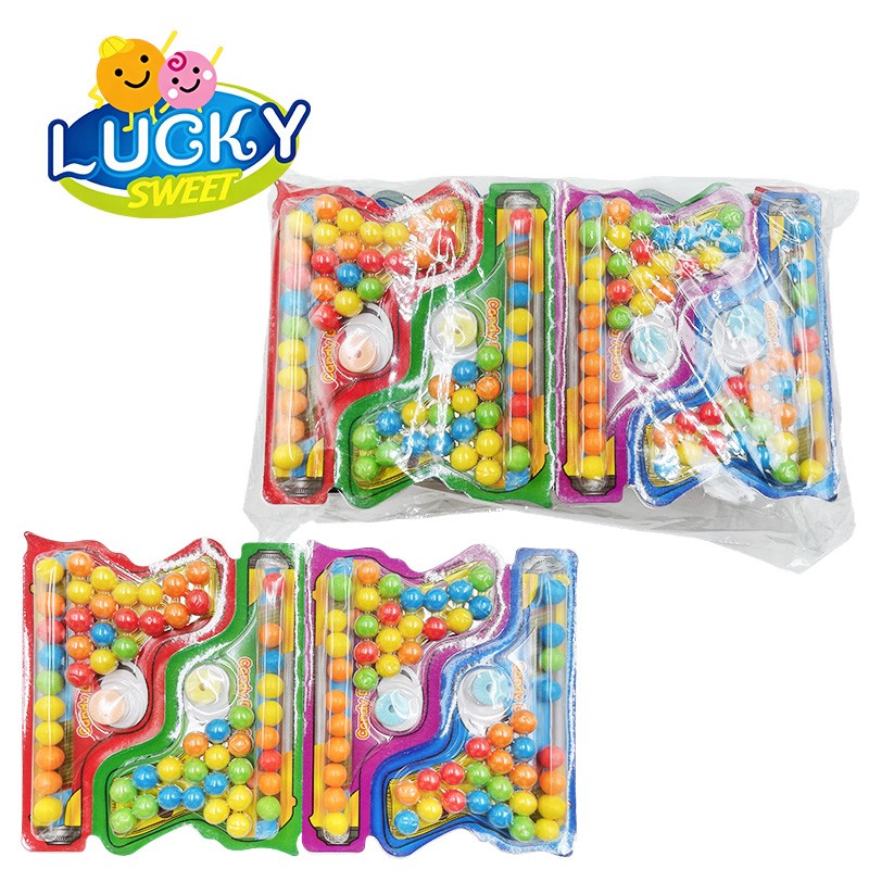 Gun-shaped compressed candy