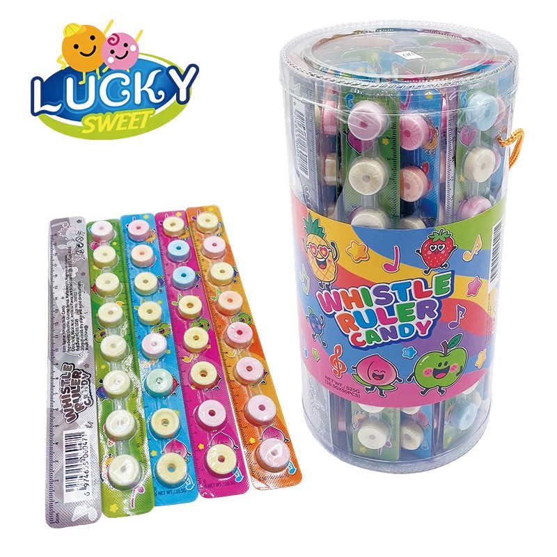 Ruler-shaped whistle pressed candy