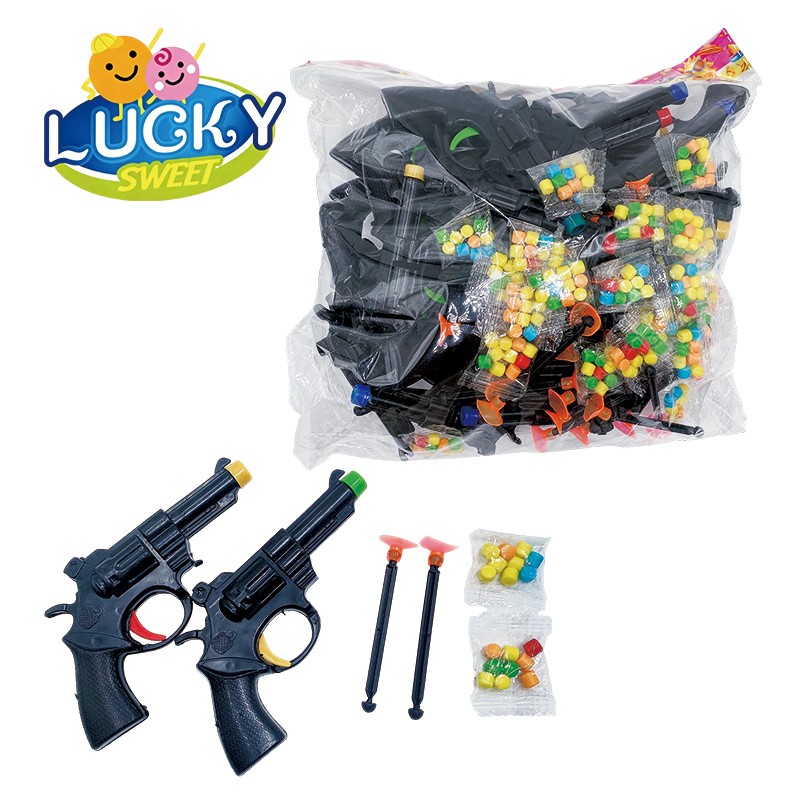 Spring-loaded toy gun with candy